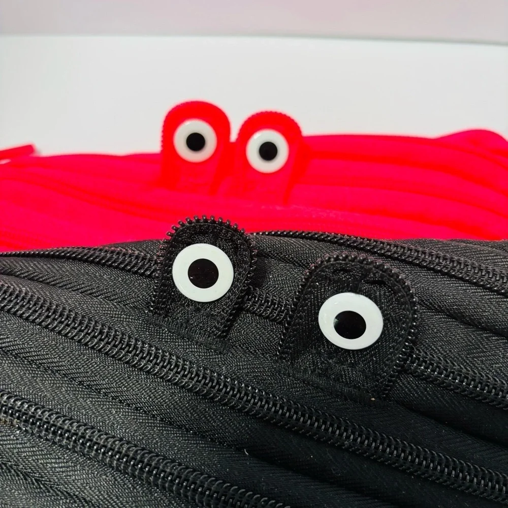 Red and Black Monster-Inspired Accessory Bags